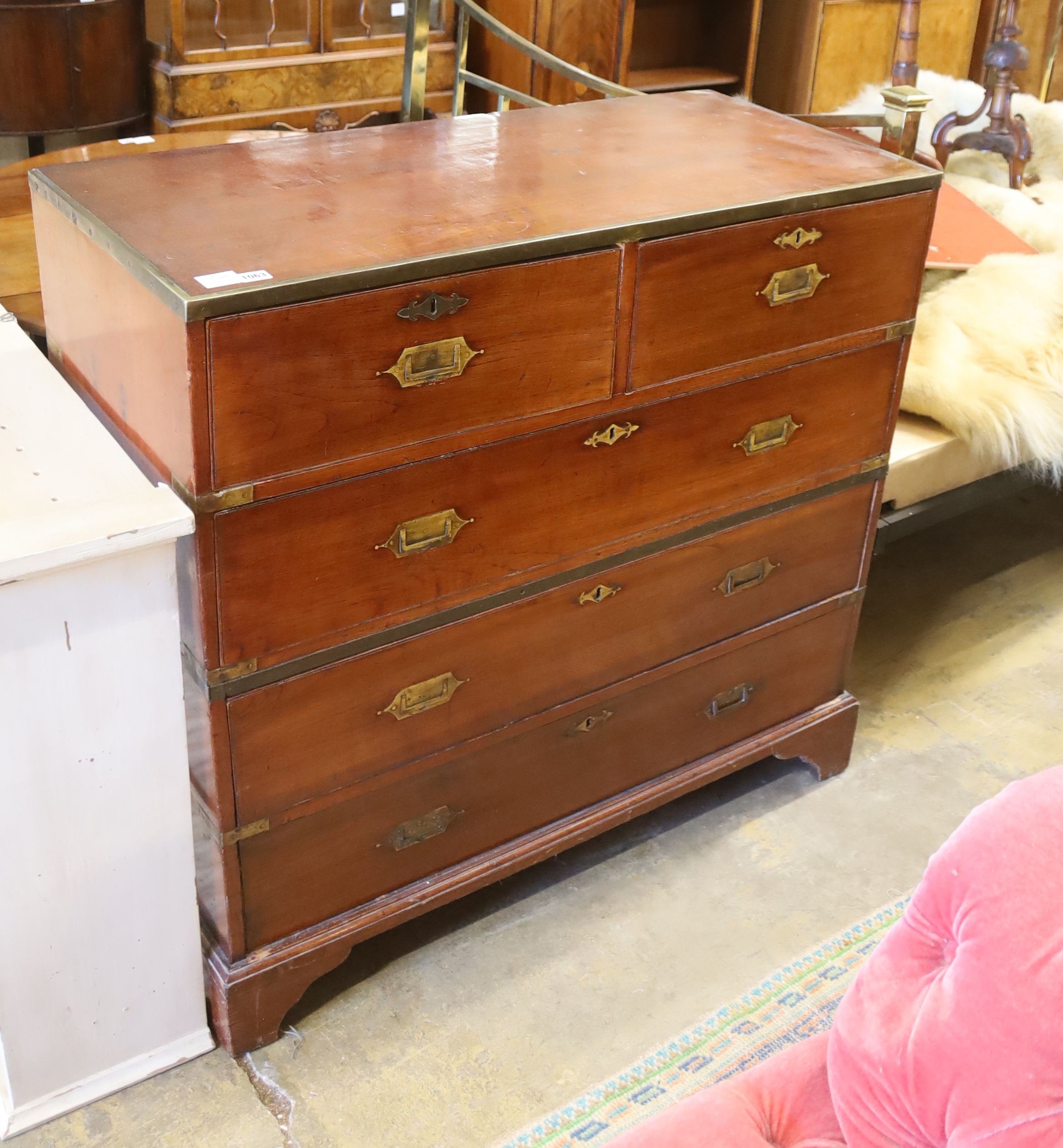 A Victorian brass mounted mahogany campaign chest of drawers, width 106cm, depth 40cm, height 102cm